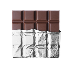 Delicious milk chocolate bar wrapped in foil isolated on white