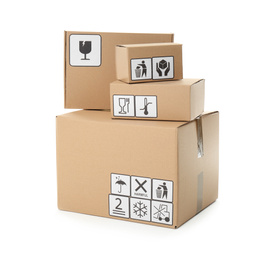 Cardboard boxes with different packaging symbols on white background. Parcel delivery