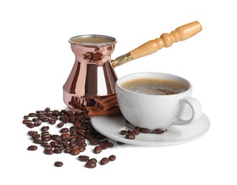 Photo of Turkish coffee. Cezve and cup with hot coffee, beans and cinnamon on white background