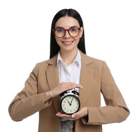 Businesswoman holding alarm clock on white background. Time management