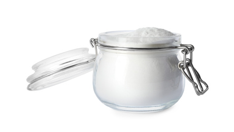 Baking soda in glass jar isolated on white