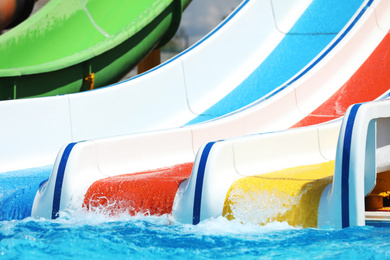 Water park with colorful slides. Summer vacation