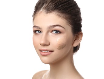 Beautiful girl on white background. Using concealer and foundation for face contouring