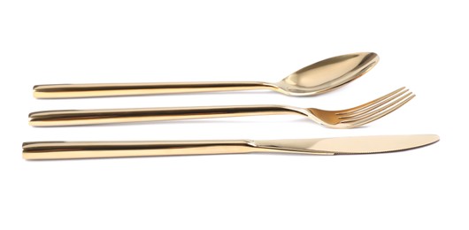 New shiny golden cutlery on white background