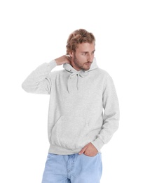 Photo of Portrait of man in hoodie sweater on white background. Space for design