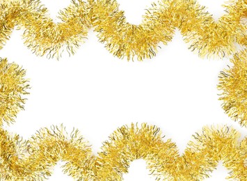 Frame made of shiny golden tinsels on white background, top view. Space for text