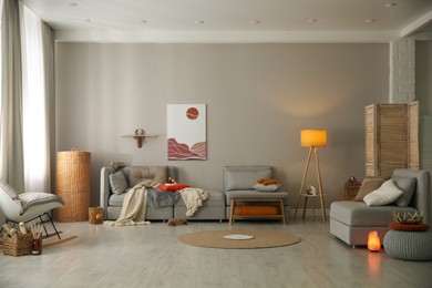 Spacious living room interior with comfortable sofa