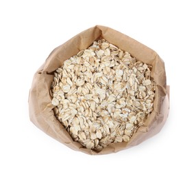 Raw oatmeal in paper bag isolated on white, top view