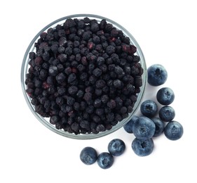 Sweet sublimated and fresh blueberries on white background, top view