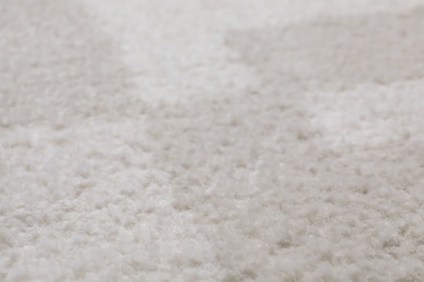 Photo of Fuzzy carpet texture as background, closeup view