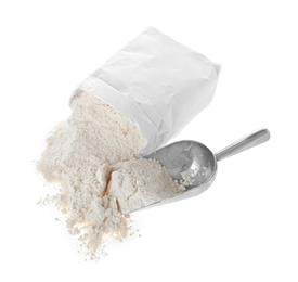 Overturned paper bag and scoop with flour isolated on white