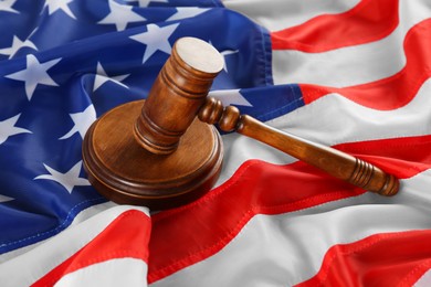 Judge's gavel on flag of United States