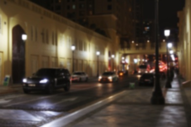 DUBAI, UNITED ARAB EMIRATES - NOVEMBER 03, 2018: Blurred view of city street traffic at night