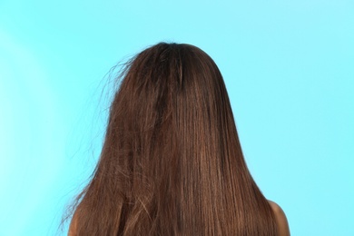 Photo of Woman before and after hair treatment on color background