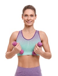 Photo of Portrait of sportswoman exercising with dumbbells on white background