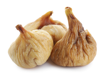 Pile of tasty dried figs isolated on white