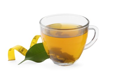 Glass cup of diet herbal tea, measuring tape and fresh leaf on white background. Weight loss