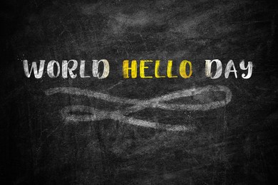 Illustration of Phrase World Hello Day written on black chalkboard