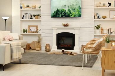 Cozy living room interior with decorative fireplace
