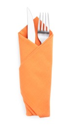 Fork and knife wrapped in orange napkin on white background, top view