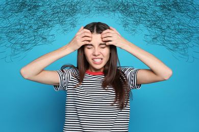 Stressed woman with mess in her head on color background