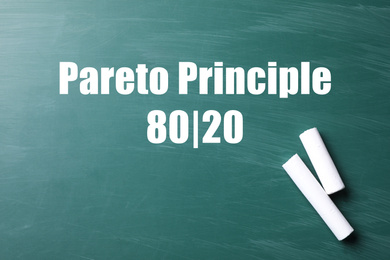 Pareto principle concept. 80/20 rule representation on chalkboard