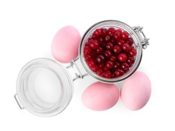 Photo of Naturally painted Easter eggs on white background, top view. Cranberries used for coloring