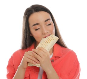 Photo of Young woman eating tasty shawarma isolated on white