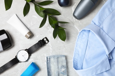 Flat lay composition with natural male  deodorants on grey marble table