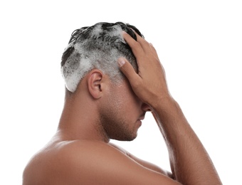 Man washing hair on white background. Personal hygiene