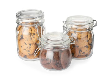 Jars of chocolate chip cookies on white background