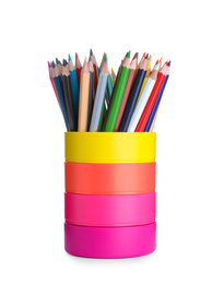 Many colorful pencils in holder isolated on white. School stationery