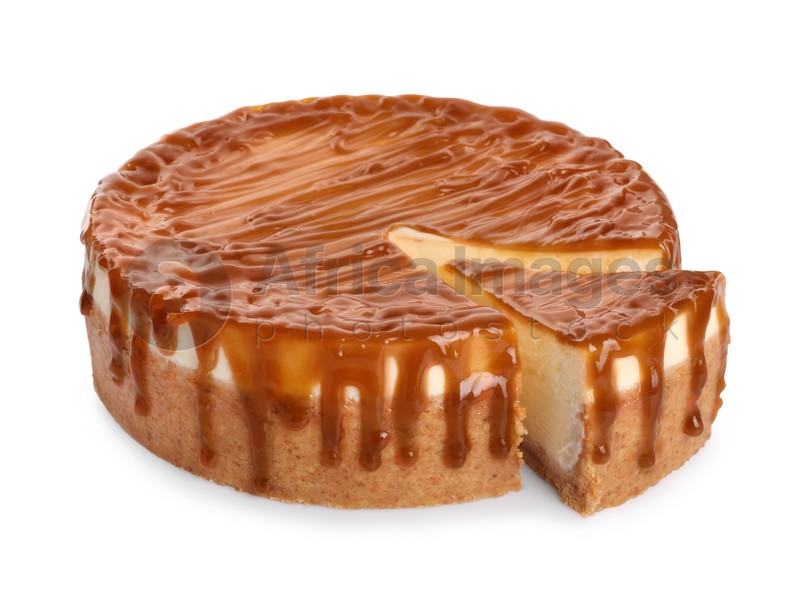 Sliced delicious cheesecake with caramel isolated on white