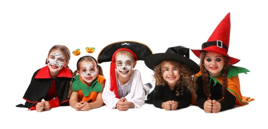 Cute little kids wearing Halloween costumes on white background