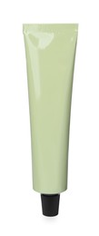 Pale green tube of hand cream isolated on white. Mockup for design