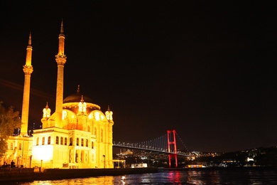 ISTANBUL, TURKEY - AUGUST 08, 2019: Beautiful Ortakoy Mosque and Bosphorus Bridge in evening