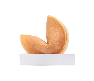 Traditional fortune cookie with prediction on white background