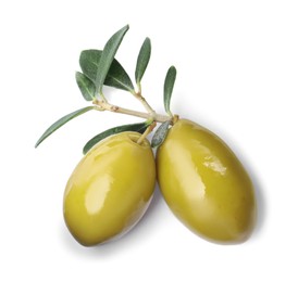 Olives with green leaves on white background, top view