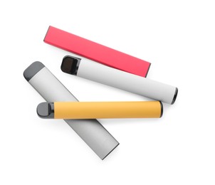 Many disposable electronic smoking devices on white background, top view