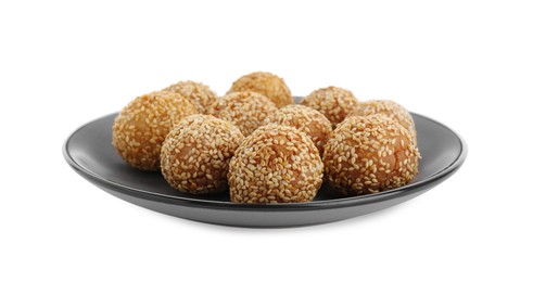 Photo of Plate of delicious sesame balls on white background