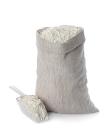 Sack and scoop with flour on white background