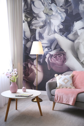 Beautiful floral photoart work used as wallpaper in living room interior