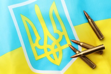 Bullets on national flag of Ukraine, top view