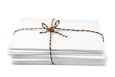Stack of letters wrapped with rope on white background