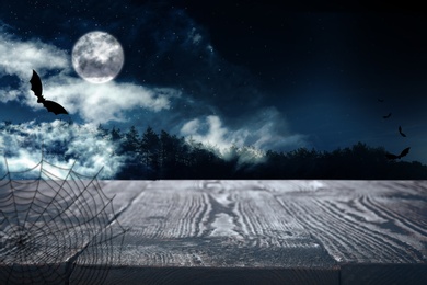 Wooden surface and bats flying in night sky with full moon. Halloween illustration