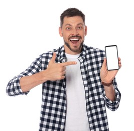 Emotional man pointing at smartphone on white background