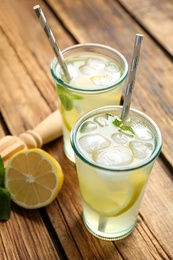Natural lemonade with mint on wooden table. Summer refreshing drink