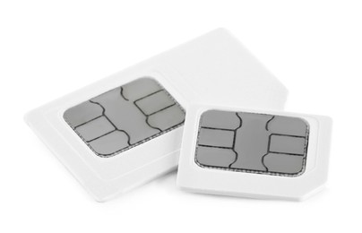 Mini and micro SIM cards on white background