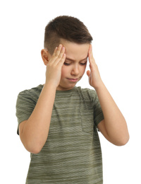Portrait of preteen boy with headache on white background