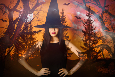 Double exposure of witch and misty forest under full moon on Halloween